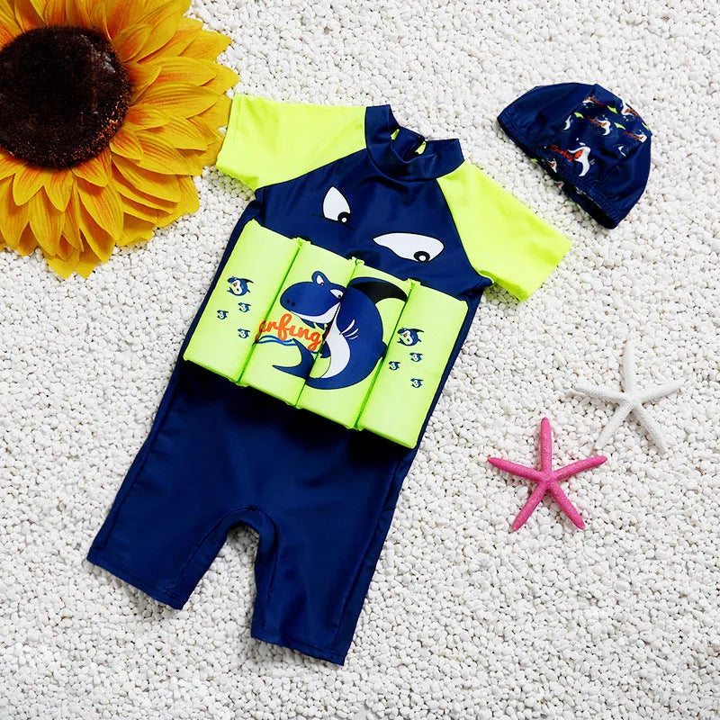 A child's one-piece buoyancy swimsuit with cartoon print, showing sun protection and flotation design.