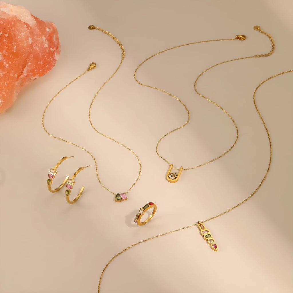 Geometric zircon necklace, ring, and earrings set with 18K gold plating on stainless steel