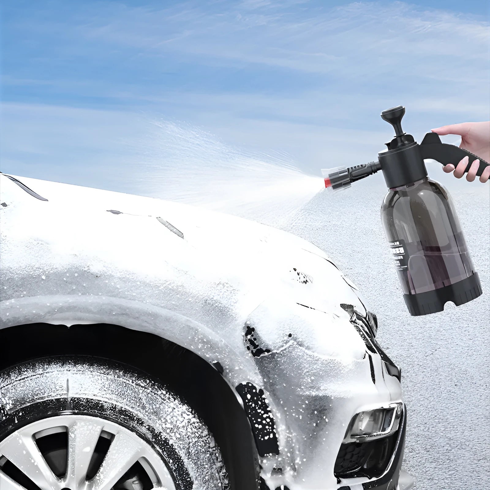 Black hand-held 2 litre foam sprayer with lock switch and nozzle attachments