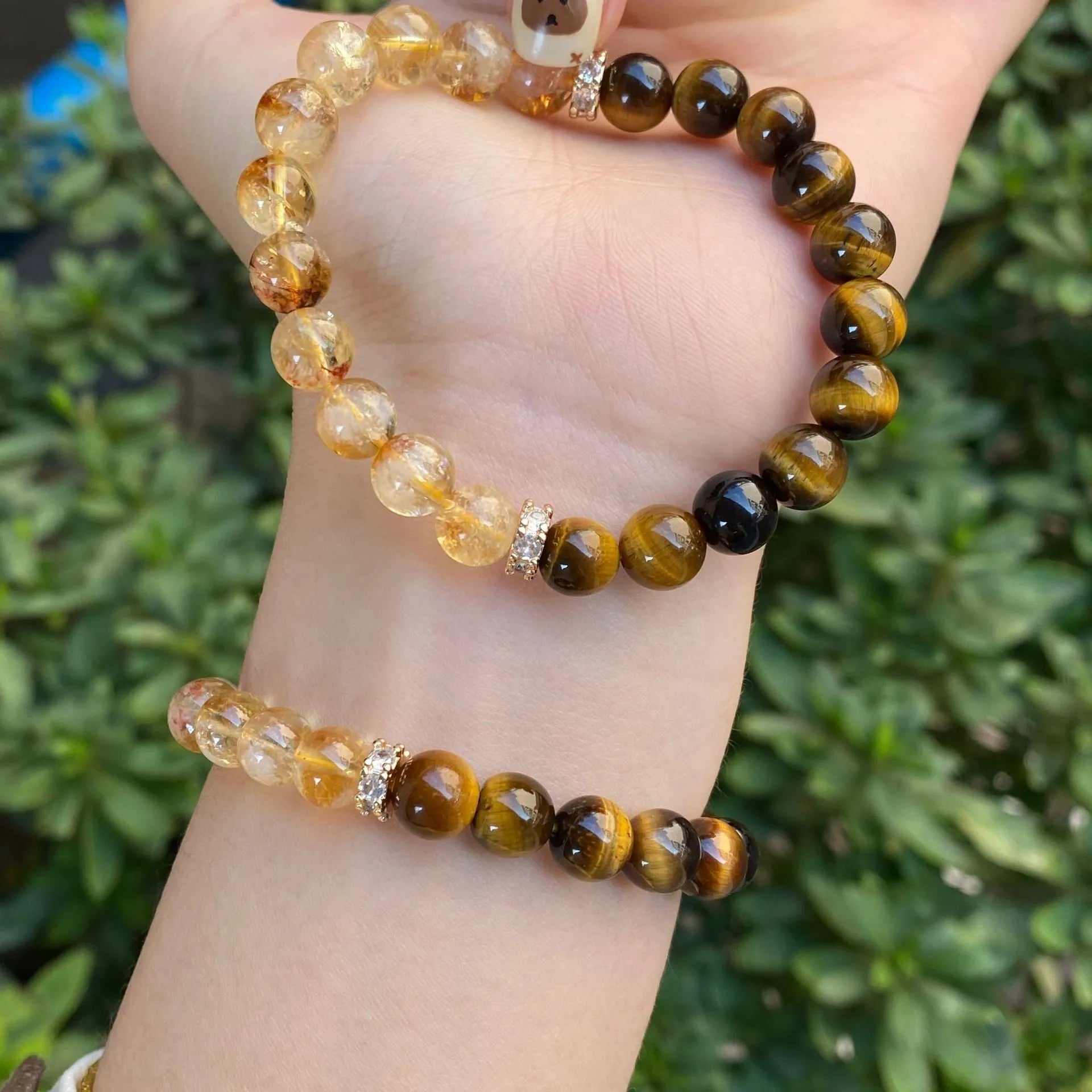 Handmade unisex crystal bracelet with diamond-studded gourd charm and mix of 8mm and 10mm prayer wheel, topaz, and disc beads.