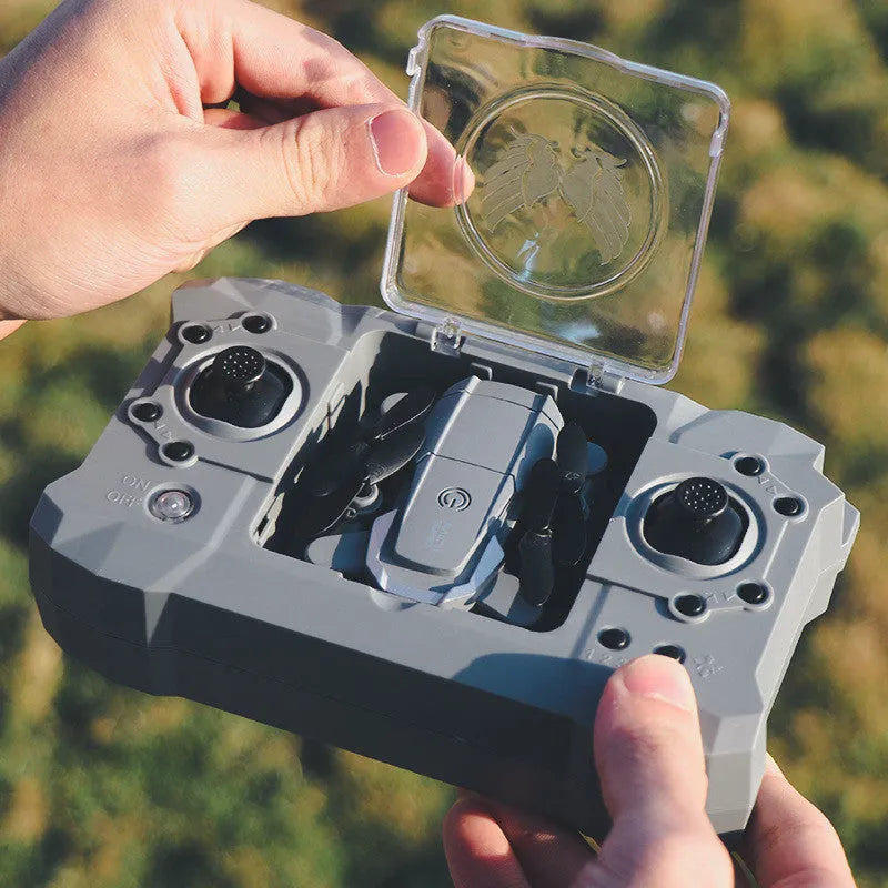 Mini 4-channel alloy drone with 4K camera and retractable remote control, folded size 6x7.5x3 cm