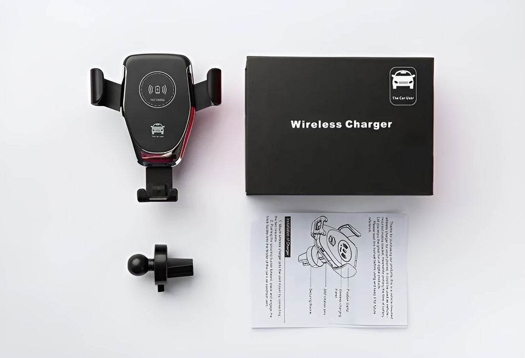 Black car Qi wireless charger with automatic clamp mounted on a vehicle air vent.