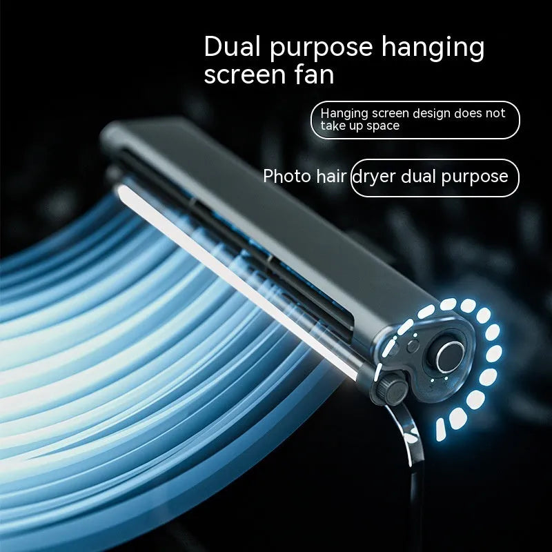 Black bladeless USB clip-on fan with integrated lamp attached to a laptop screen.