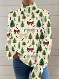 Women's loose-fit Christmas printed turtleneck sweater in a soft macaron colour.