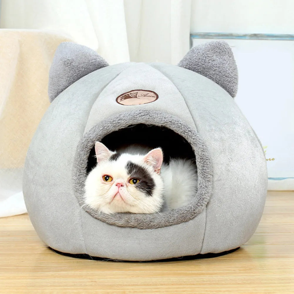 Large enclosed winter cat sofa bed with plush lining for indoor pet warmth