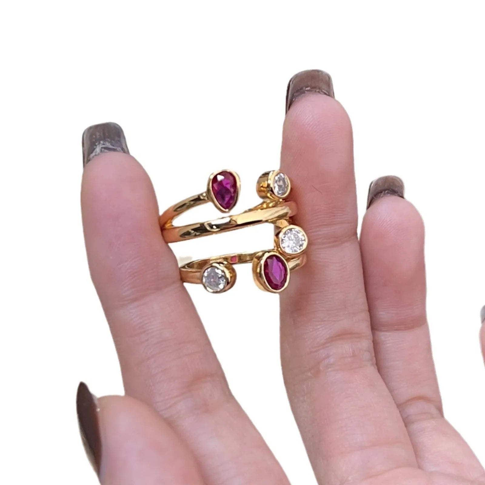 Irregular cross geometric ring with two-colour diamond detailing on copper with electroplated finish