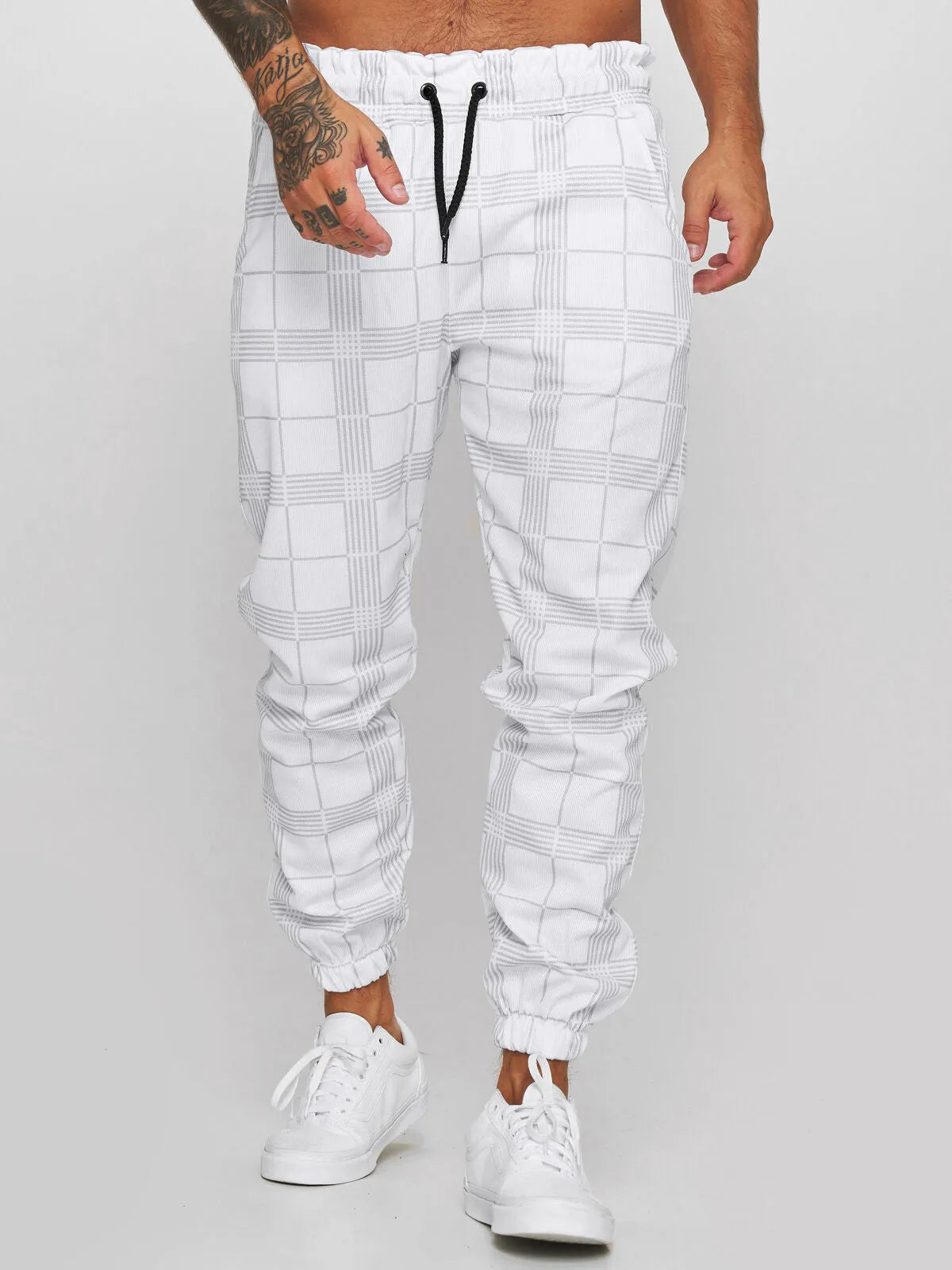 Cotton printed casual tapered trousers for men in black side view