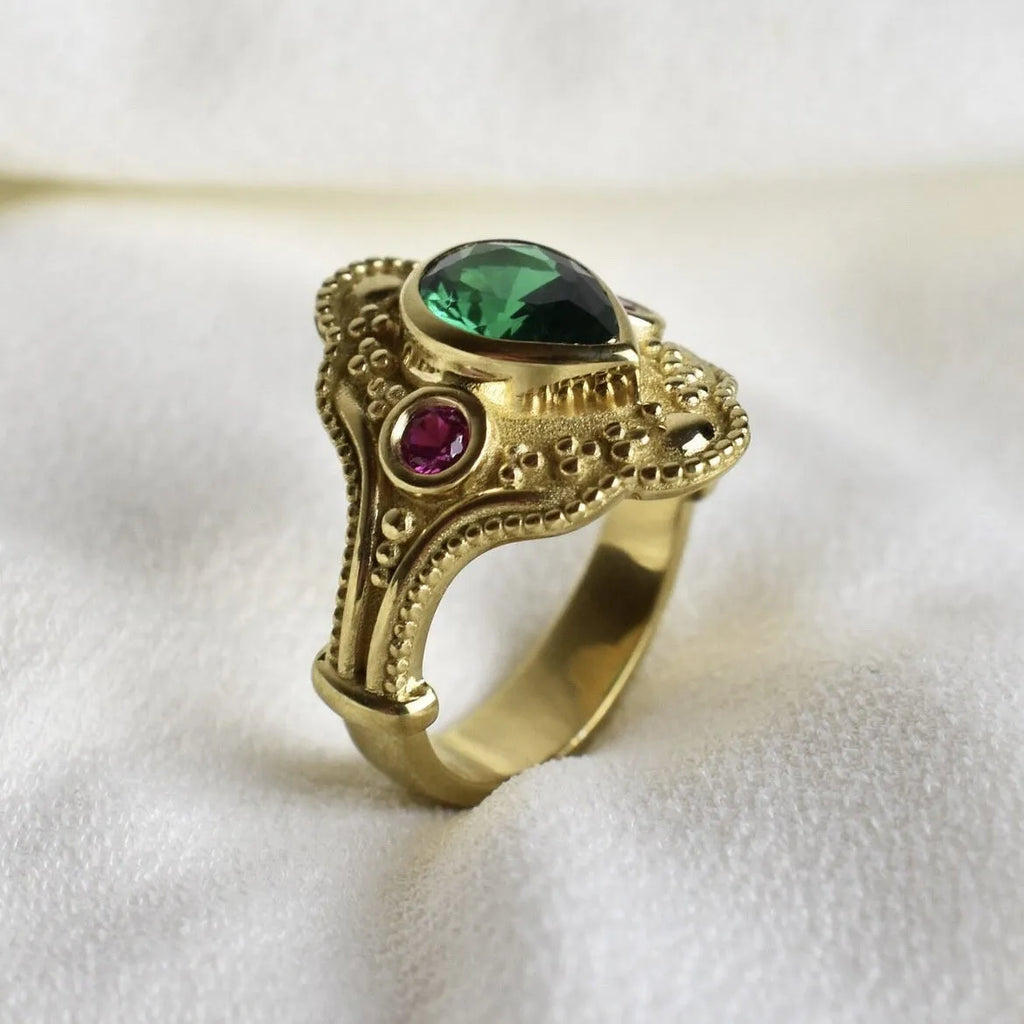Gold geometric women's ring on display showing alloy construction with electroplated finish