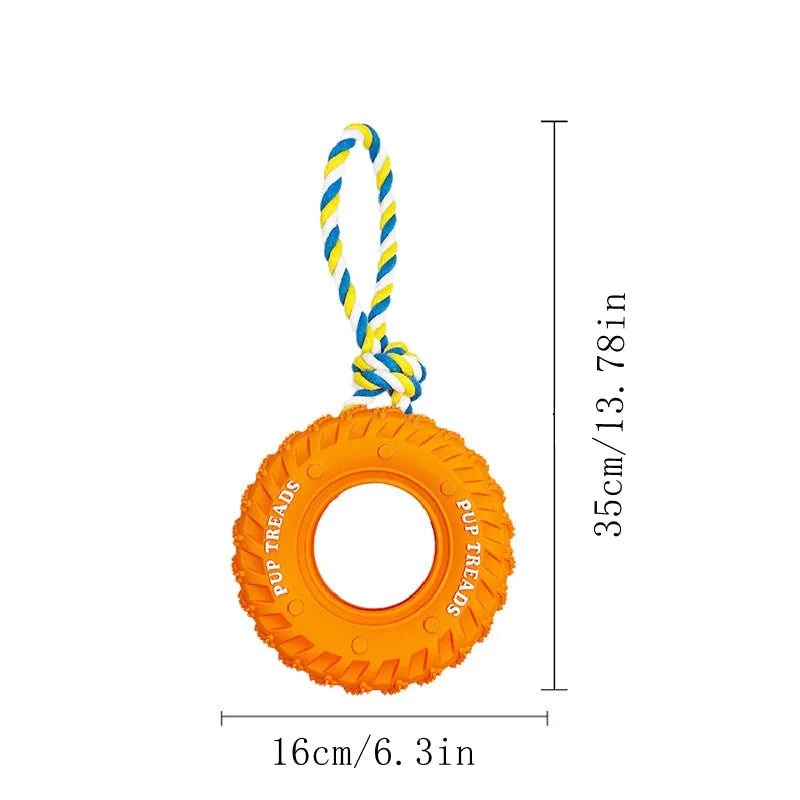 Dog chew toy with black rubber tyre and attached rope for interactive play