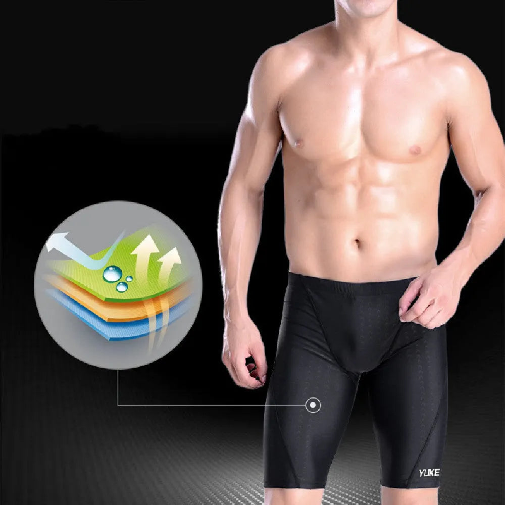 Men's black 5-piece waterproof swimming set including briefs trunks, anti-fog goggles, swimming cap, ear plugs with nose clip and carry bag