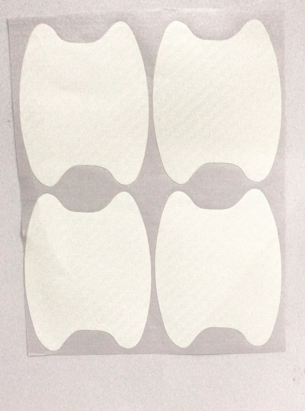 4-piece carbon fibre car handle sticker set in black for scratch-resistant door handle protection