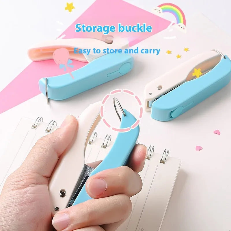 Small manual punching machine with embossed design and changeable dies for love, star, 4mm and 6mm round shapes.