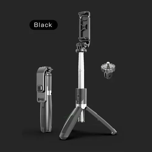 Black Bluetooth selfie stick with tripod legs extended and wireless remote, shown next to a smartphone.