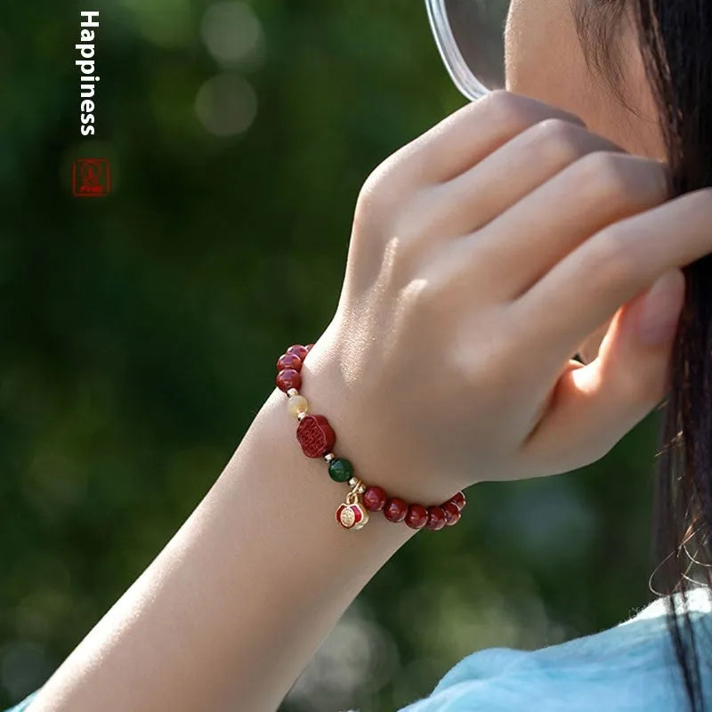 Emperor Sandstone bead bracelet with Fu character charm in New Chinese style.