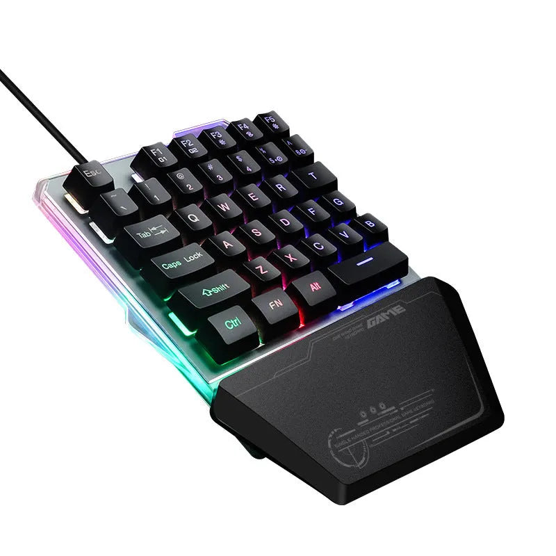 Black G40 Flow one-handed mechanical gaming keyboard with RGB backlit keys on a desk.