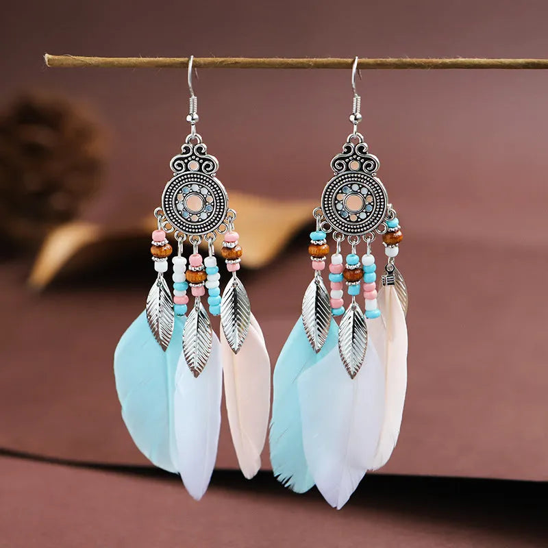 Round drop feather earrings with leaf pattern in alloy metal, available in multiple colours