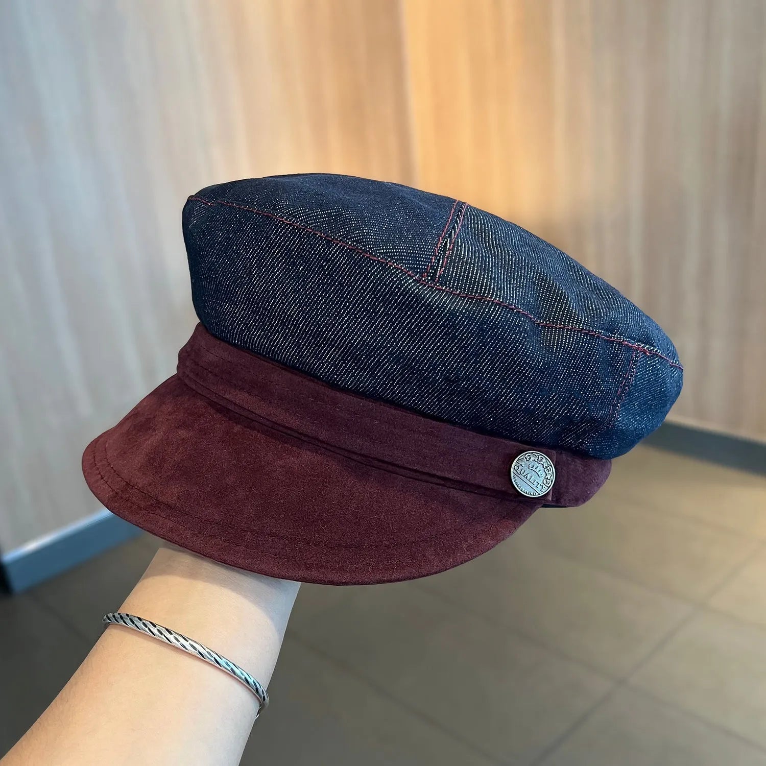 Dark blue denim octagonal newsboy hat with adjustable sizing for 54-58cm head circumference