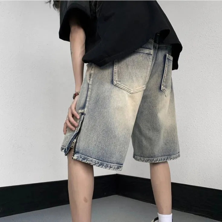 Blue retro-style denim shorts with a loose wide-leg cut and tattered detailing.