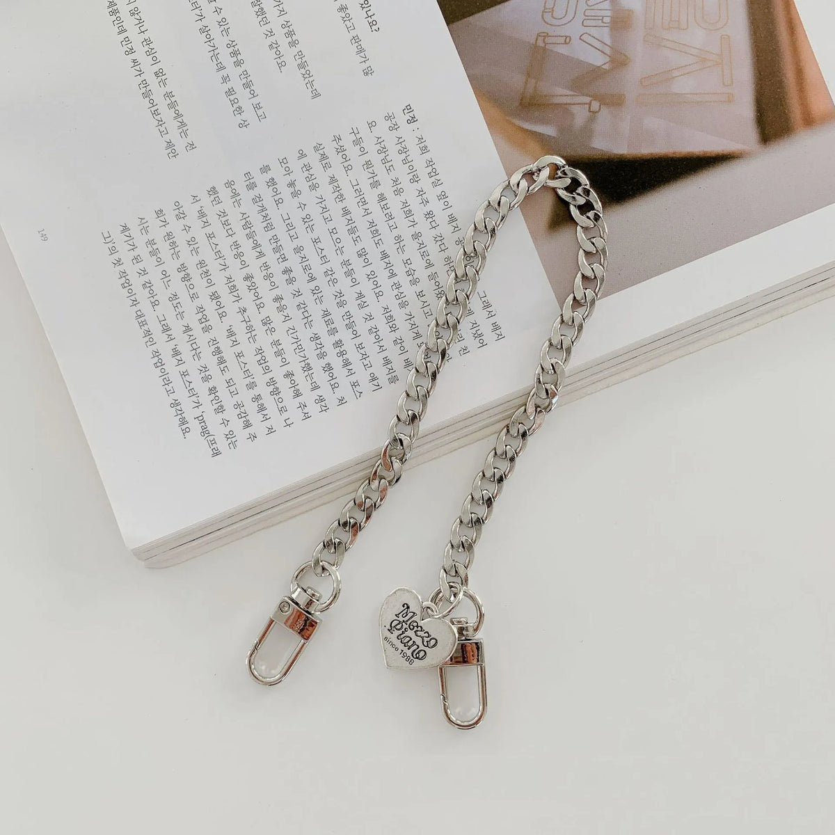 Electroplating mirror TPU phone case with animal print and attached chain for iPhone 13 Pro Max