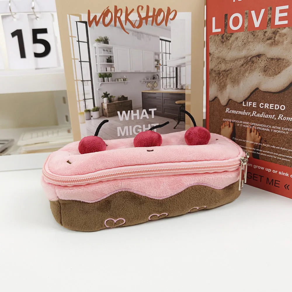 Cherry cake print velvet pencil case with a zip, shown closed.