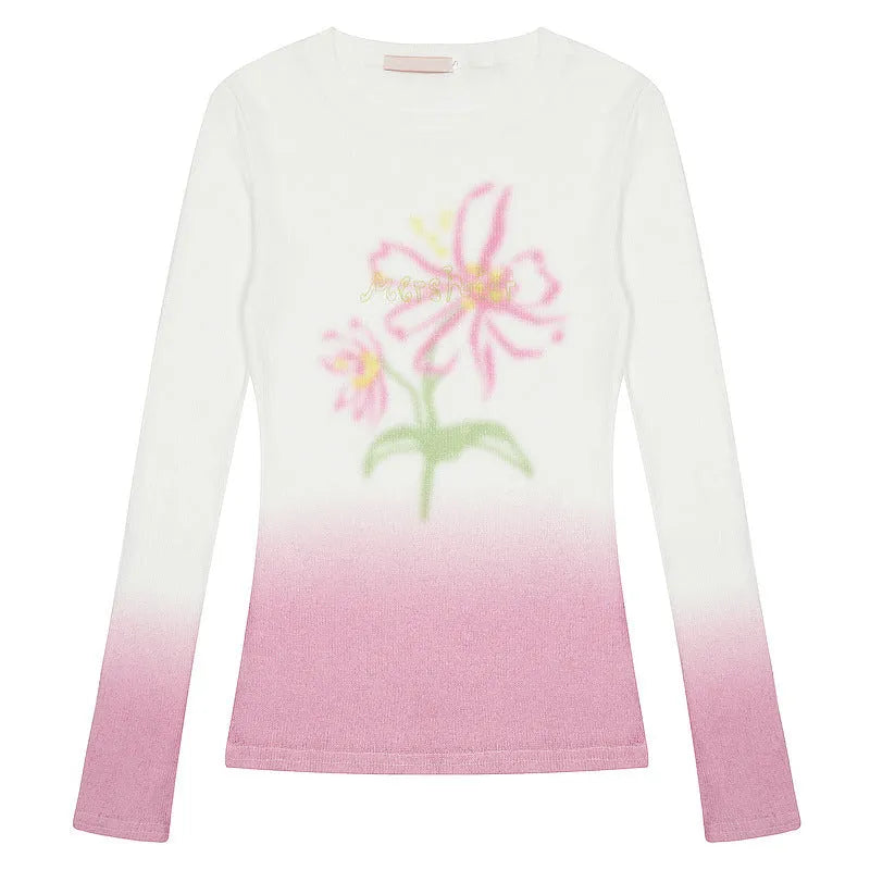 Women's long-sleeved gradient flower print T-shirt in light pink, made from thin polyester fabric.