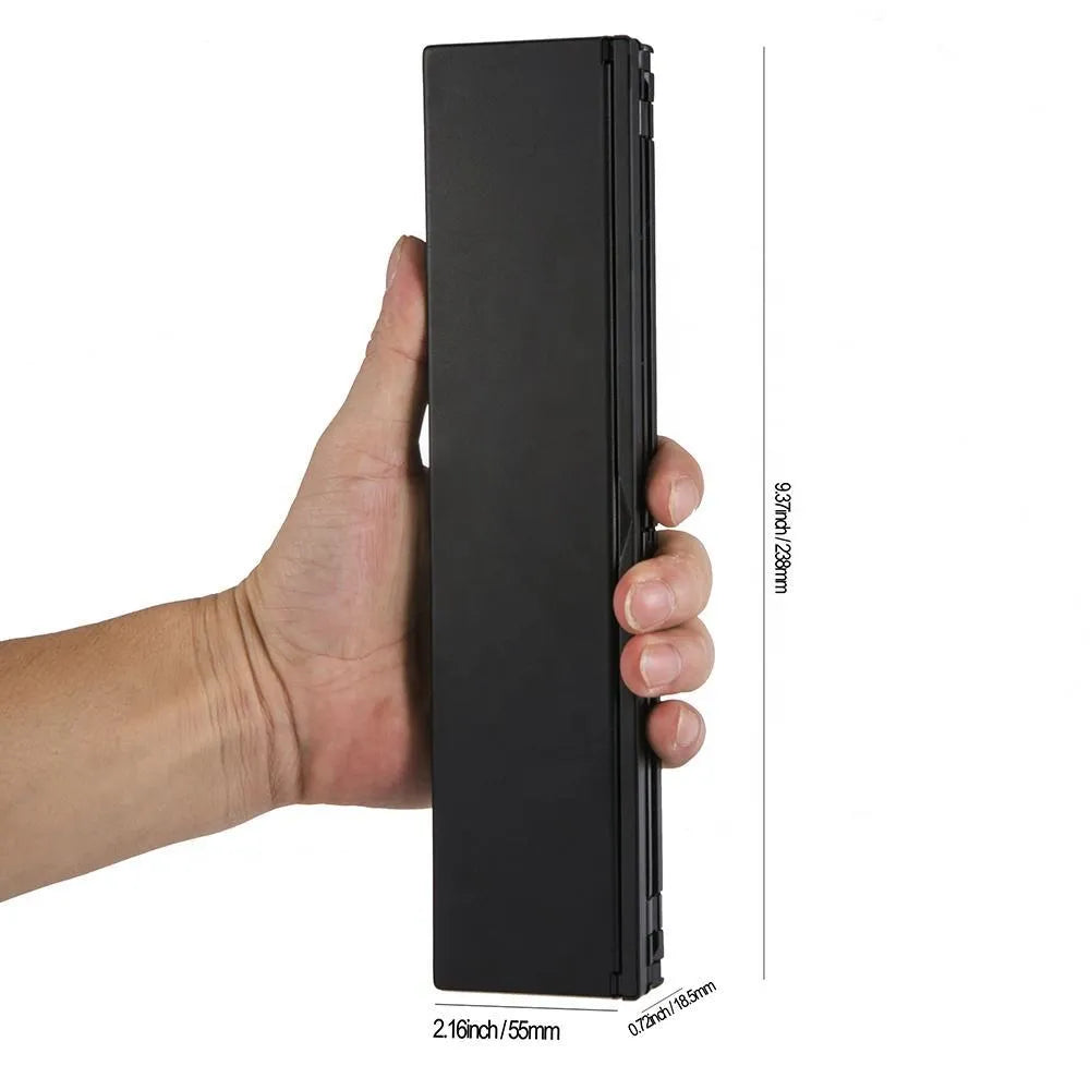 Black folding wireless Bluetooth keyboard for tablets with numeric keypad shown open and closed