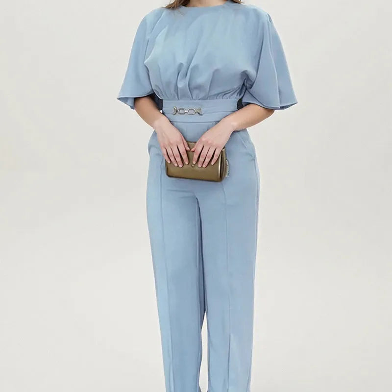 Blue men's two-piece polyester suit with long sleeves and trousers on a hanger