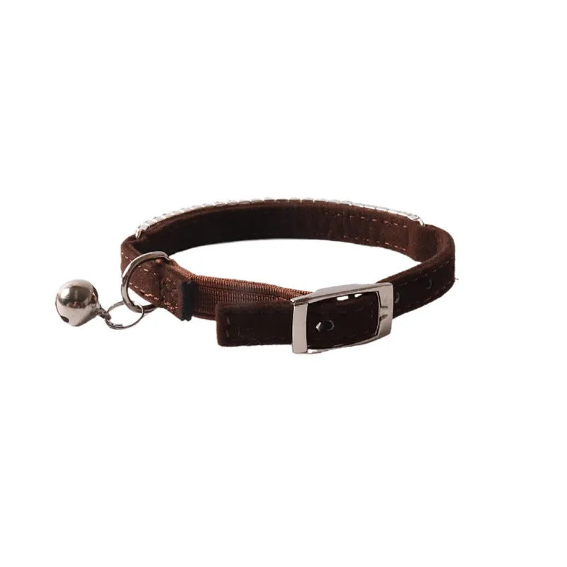 Flocked flannel cat collar with elastic buckle and gang drill pattern in multiple colours.