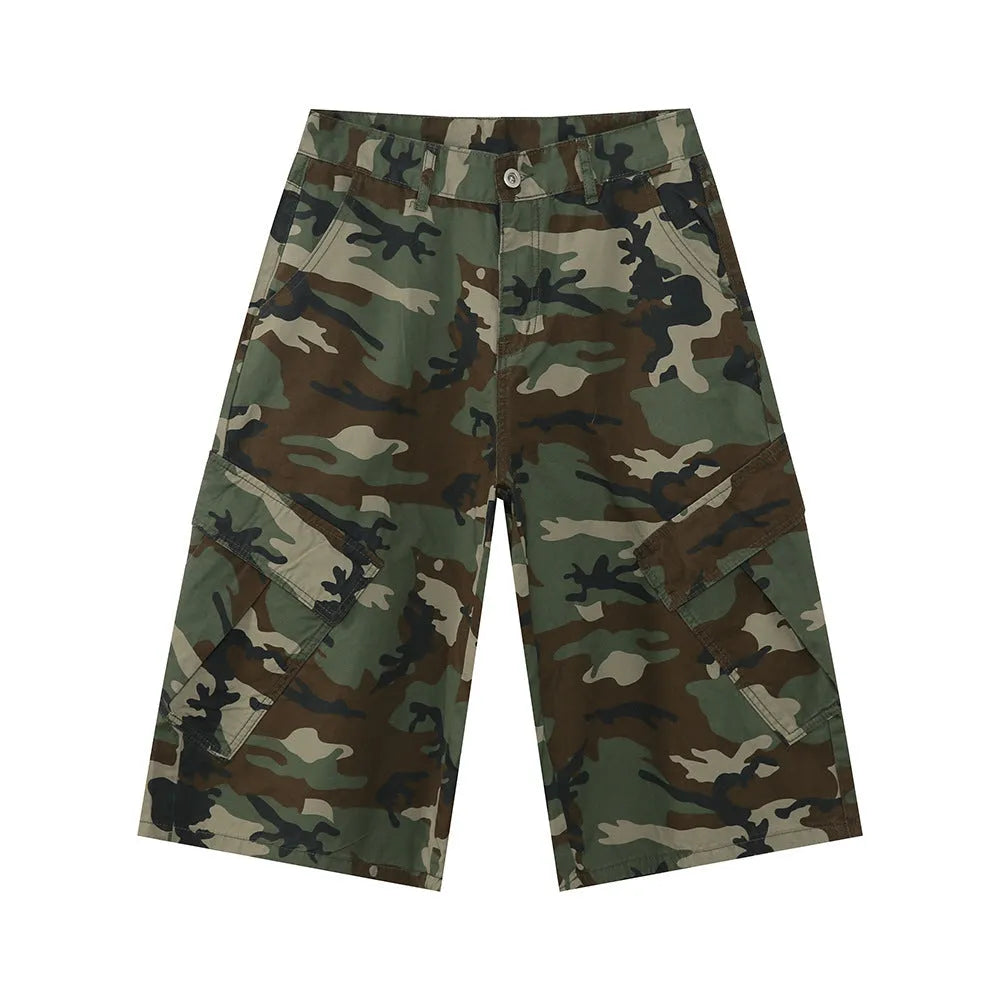 Men's cropped length camouflage cotton wide-leg jeans with large side pockets on a plain background.