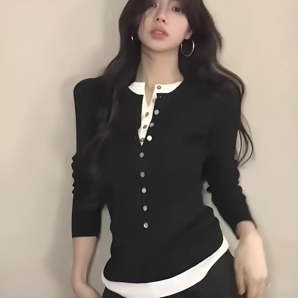 Black women's knitted fake two pieces slim fit long sleeve top on hanger