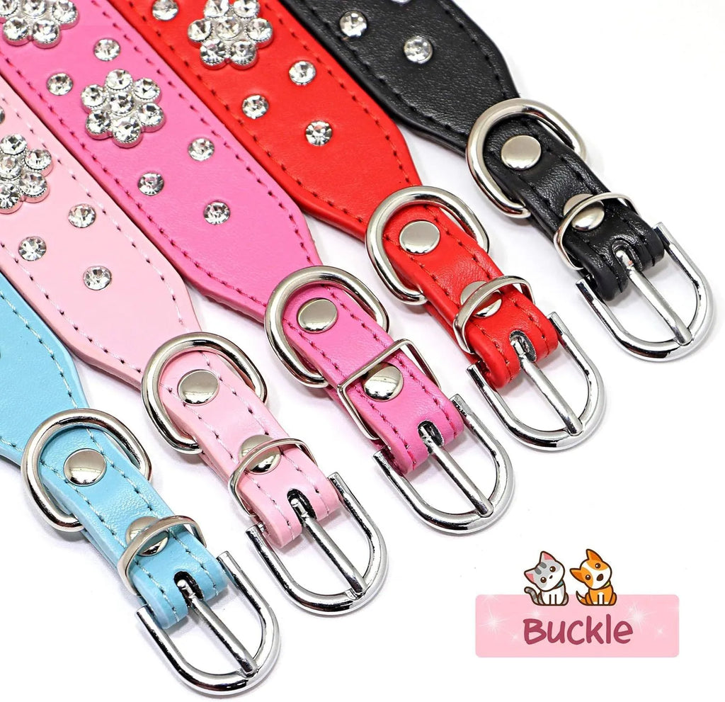 Close-up of a black PU leather dog collar with a rhinestone flower pattern and metal studs.