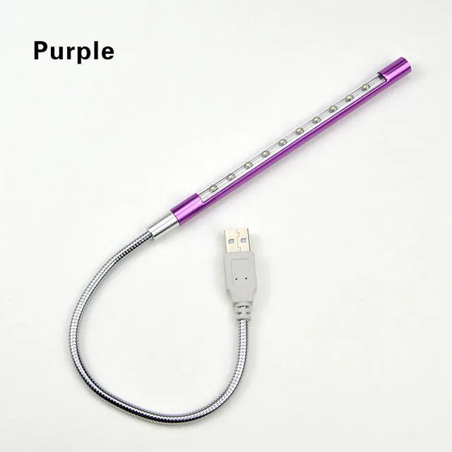 Spiral-shaped aluminium USB desk night light in choice of six colours, showing push button switch.