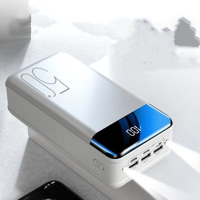 Large 50000mAh power bank in black or white with three charging ports and polymer lithium-ion cells