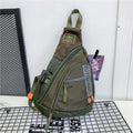 Unisex outdoor large capacity nylon chest bag in black with ventilation slots and adjustable strap