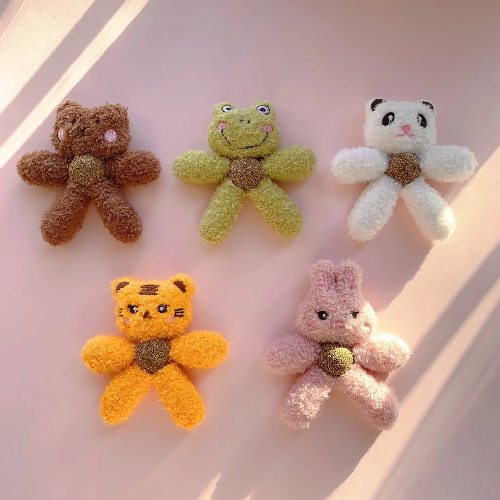 Indoor catnip chewing toy ball with cat grass, shown in animal designs like panda and bunny.