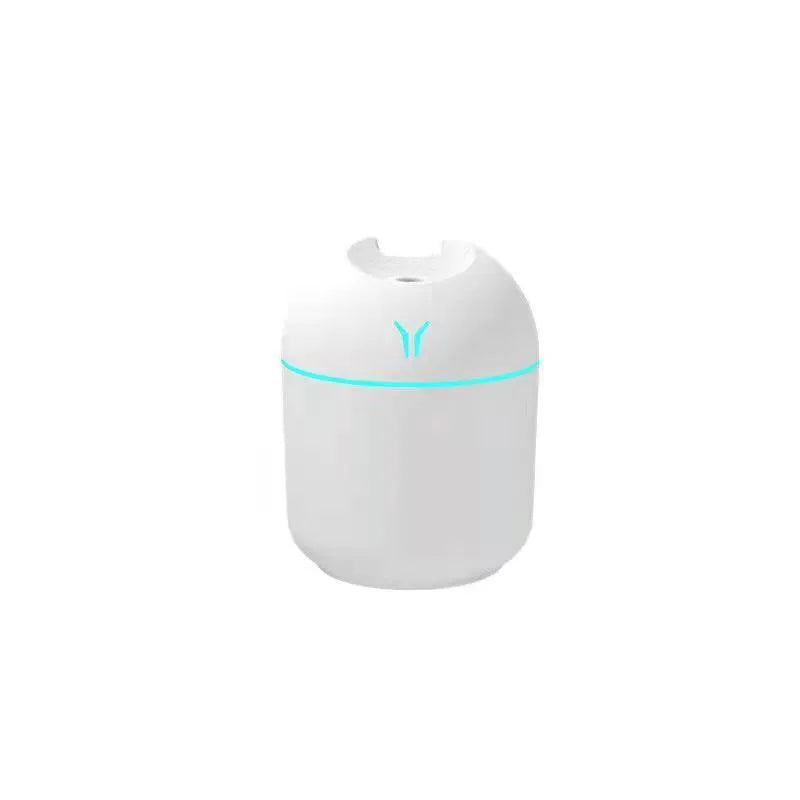 Round desktop humidifier in ivory white colour with USB cable and water tank showing 250ml capacity