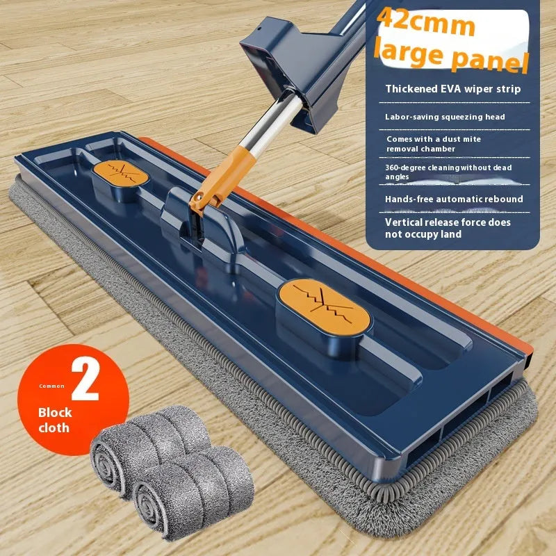 Large flat mop with stainless steel handle and blue mop cloth on hard floor