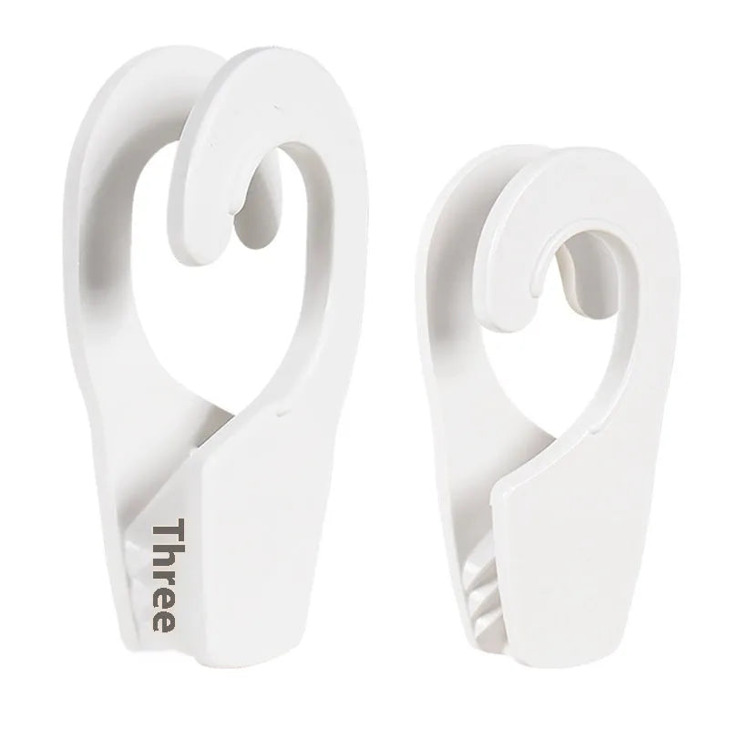 White ABS plastic marine anti-collision ball quick hook with two size options on display