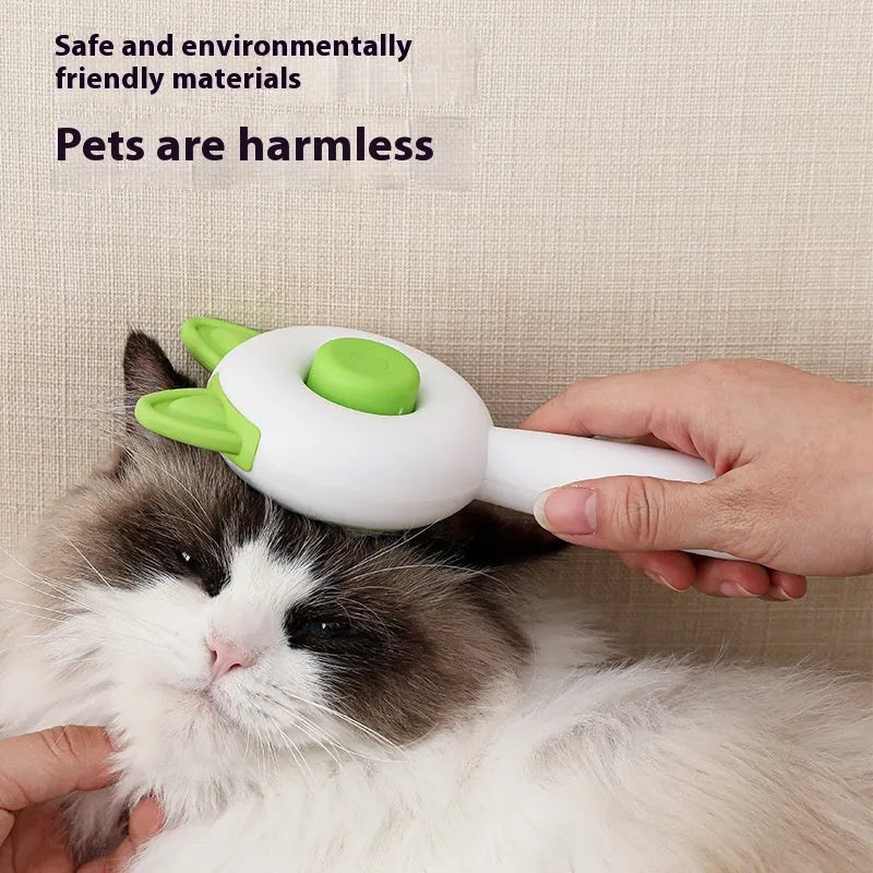 Greenish white and orange white self-cleaning cat comb with stainless steel bristles for pet hair removal.