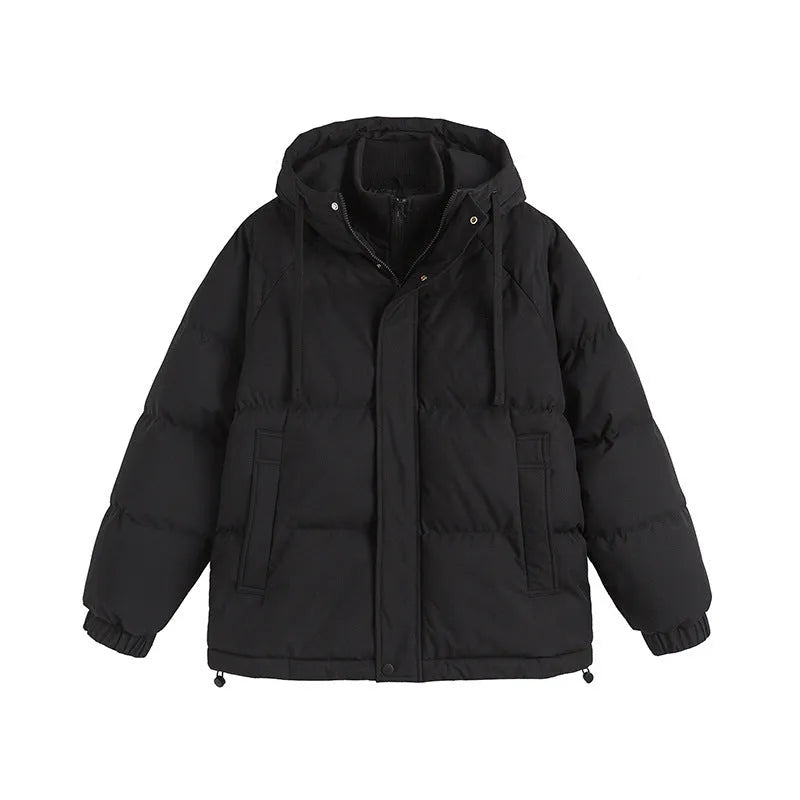 Loose fit winter coat in polyester with side seam pockets available in six solid colours