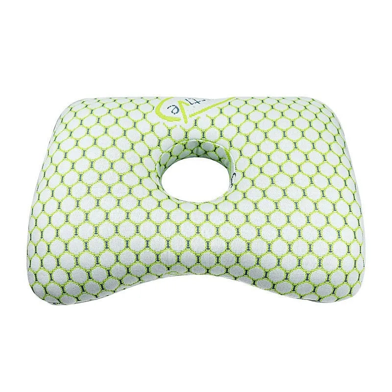 Single hole ear support pillow in grey on a white background, showing its contour and compact size.
