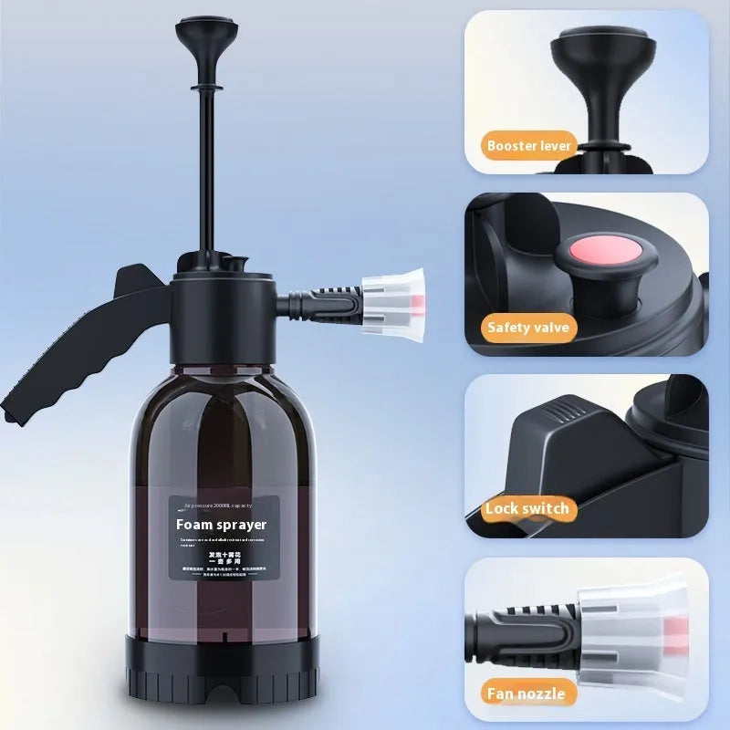 Black hand-held 2 litre foam sprayer with lock switch and nozzle attachments