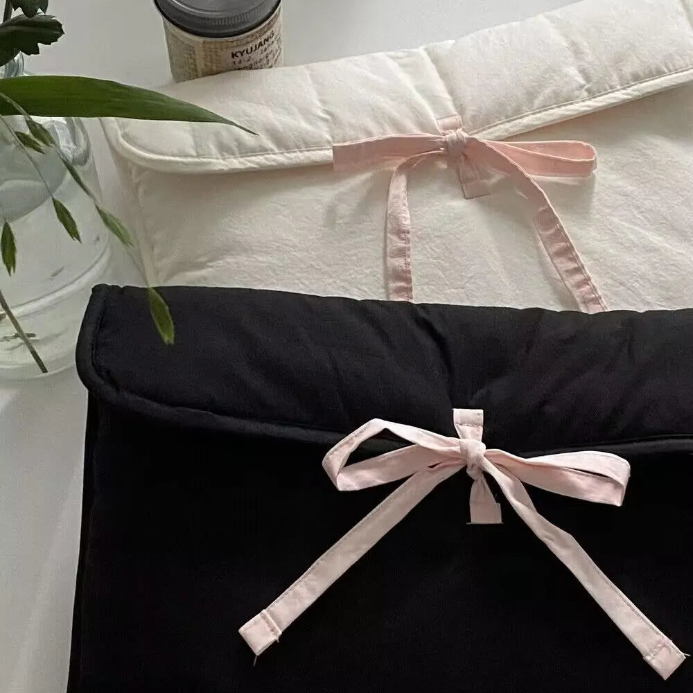 Women's black and white striped quilted computer bag with ballet bow design for laptops