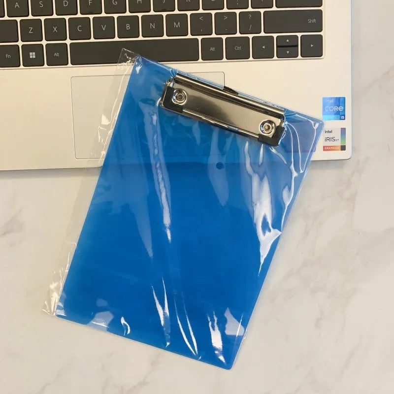 A4 transparent writing board pad with metal clip showing document display and writing surface