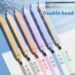 Set of double-tipped fluorescent marking pens in mixed colours on a white background.