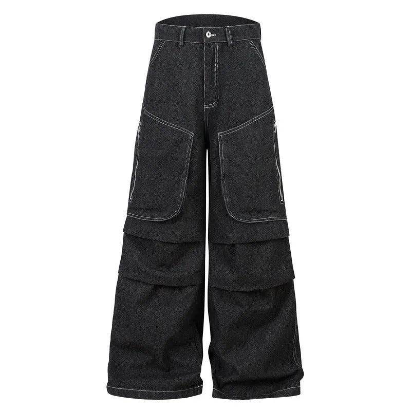 Black pleated denim jeans with multiple pockets, shown on a hanger.