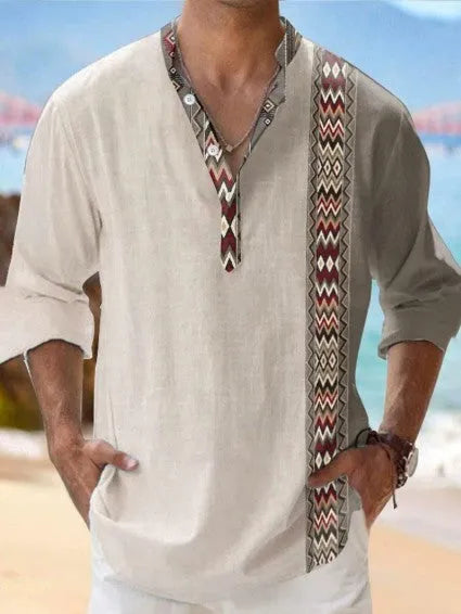 Man's thin striped digital print Hawaiian-style long sleeve cardigan shirt on a hanger.