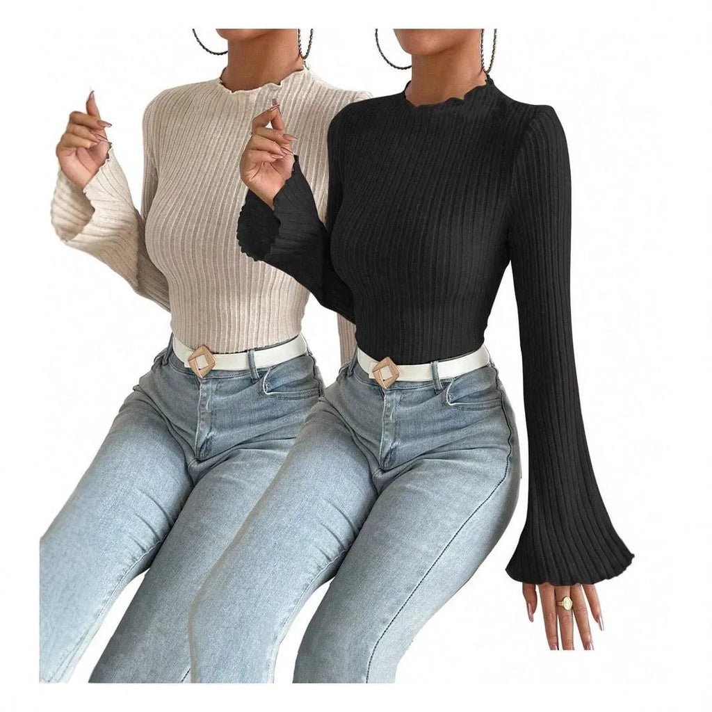 Long sleeve round neck pullover in black with lantern sleeves and a subtle sunken stripe pattern.