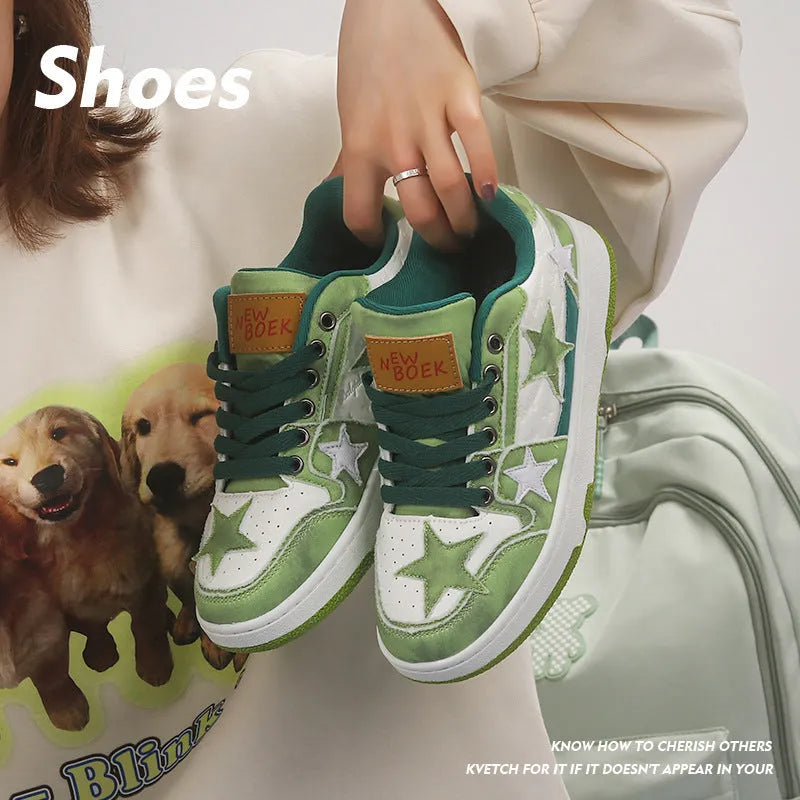 Denim skateboard shoes in black, green, or pink with flat rubber sole and lace-up front.