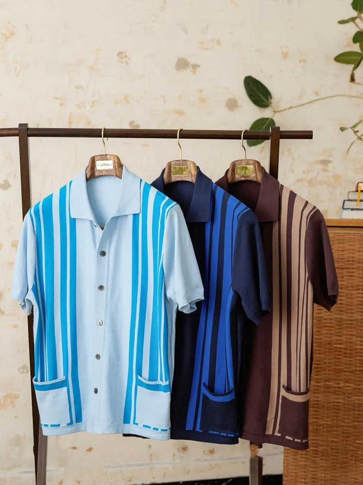 Short-sleeved striped cardigan polo shirt with a lapel collar in light blue, laid flat.